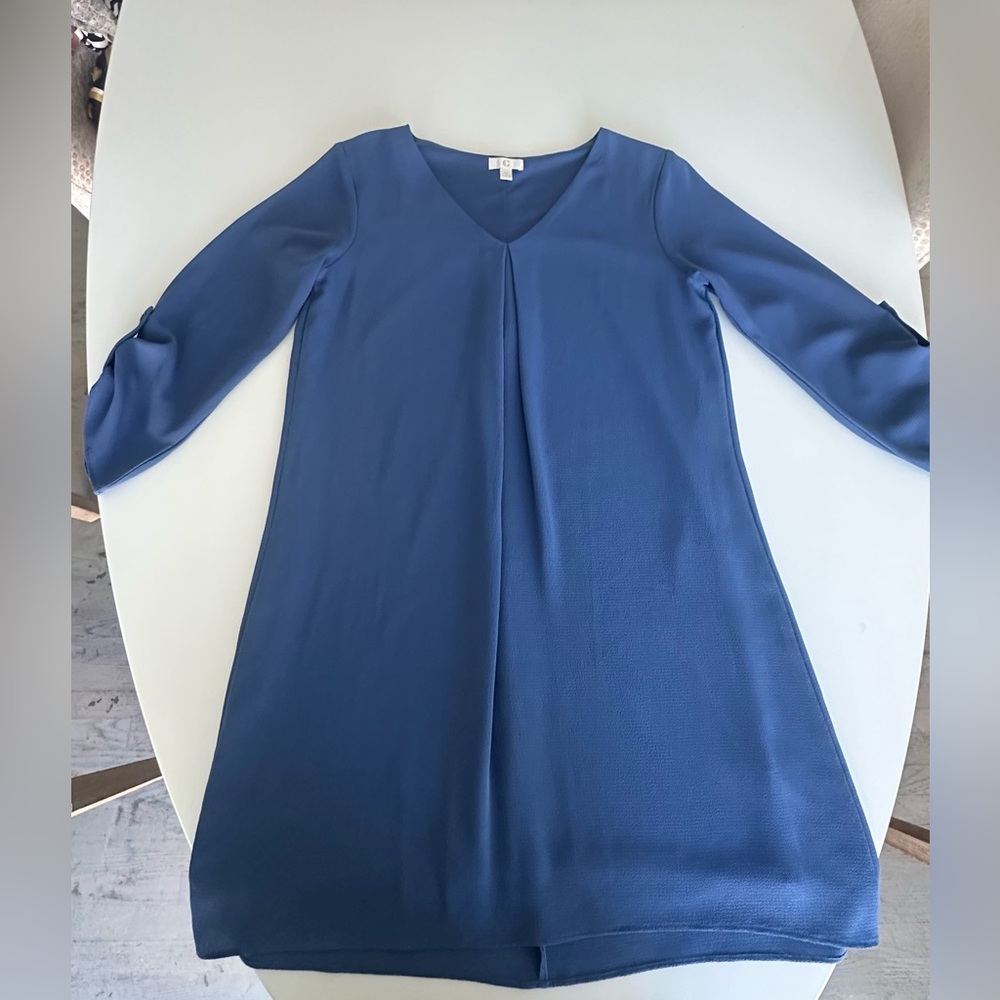 Two dresses for one
One Ch C Brand Navy Blue Garment
One ch C pink dress